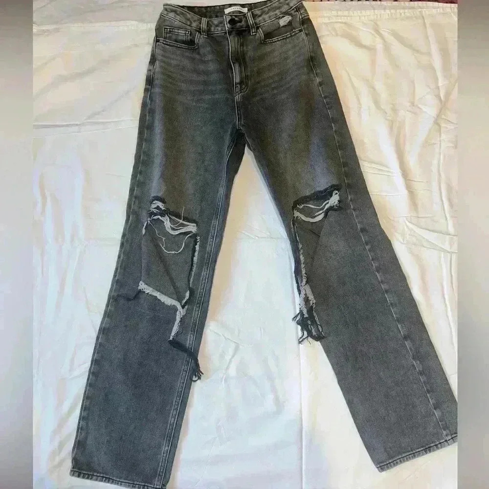 I’m selling PacSun black ripped jeans.